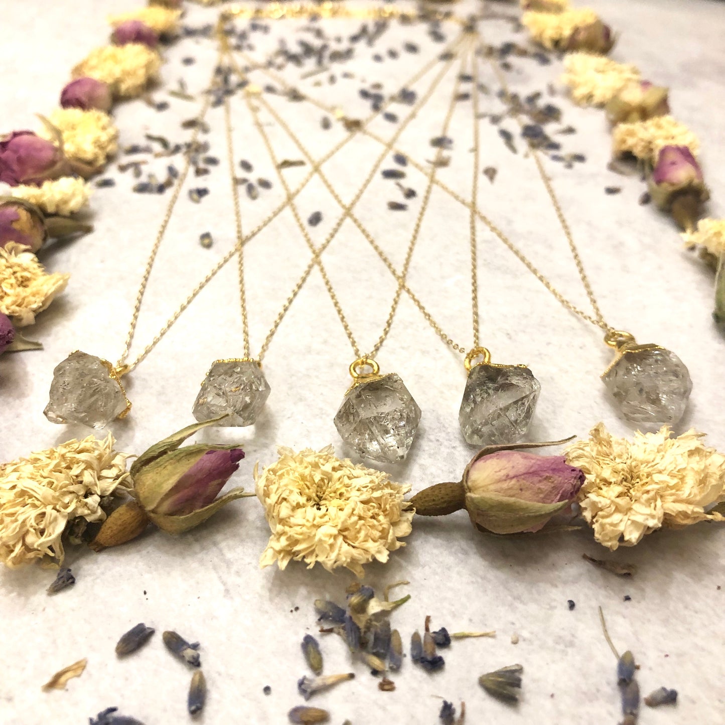 Herkimer diamond earrings with flowers below