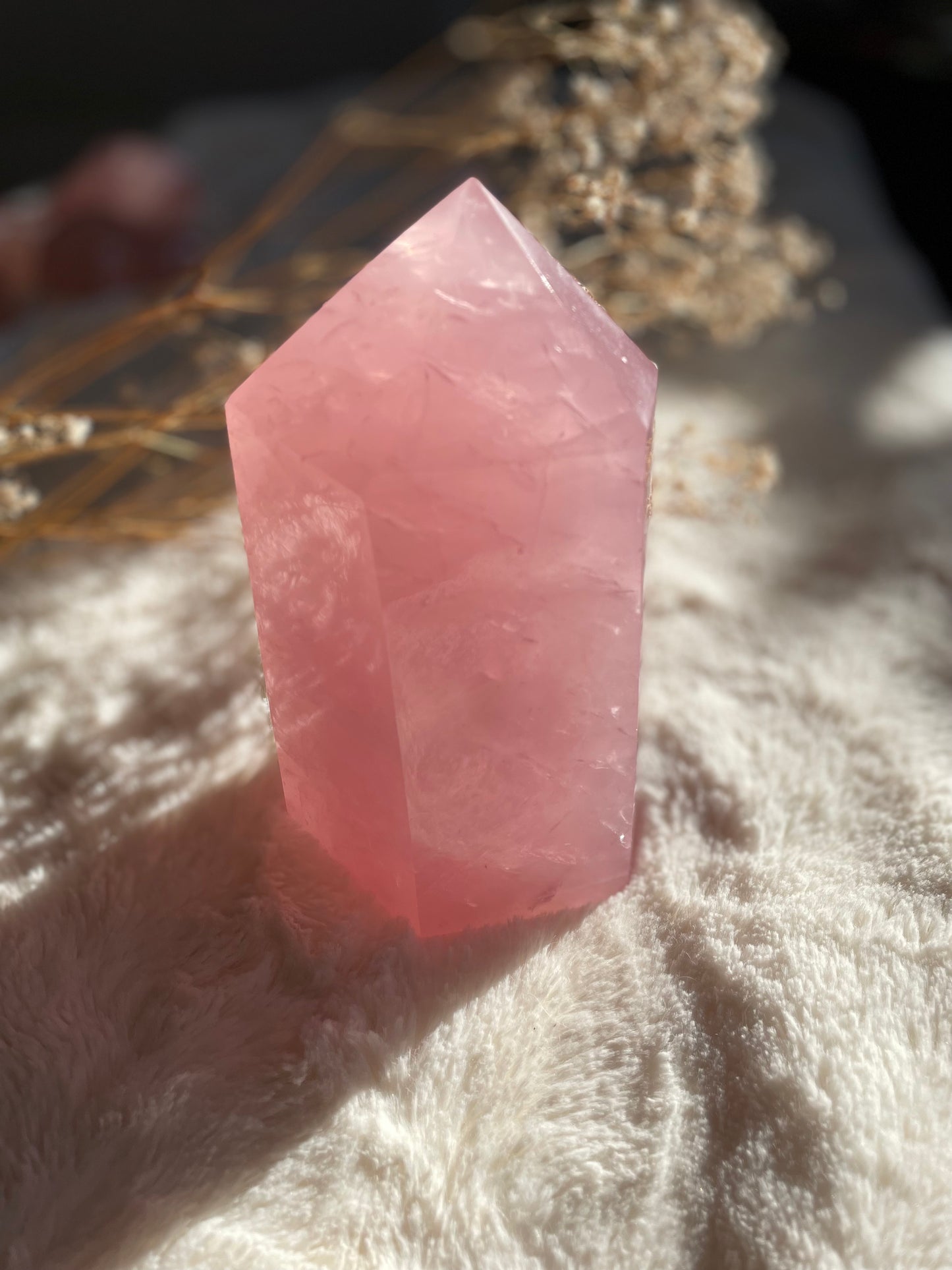 Rose quartz crystal point